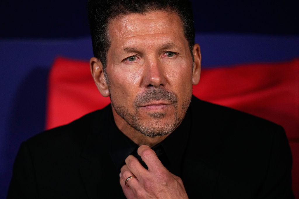 Atletico Madrid's head coach Diego Simeone sits at the bench ahead of a Champions League opening phase soccer match between Atletico Madrid and Union Saint-Gilloise in Madrid, Spain, Tuesday, Nov. 4, 2025. (AP Photo/Manu Fernandez)