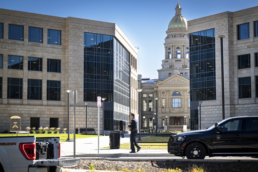 A Cheyenne Police Department officer sweeps the grounds of the Wyoming Capitol after a suspected improvised explosive device (IED) was found at the state Capitol on Tuesday, Oct. 21, 2025, in Cheyenne, Wyo. (Milo Gladstein/The Wyoming Tribune Eagle via AP) A Cheyenne Police Department officer sweeps the grounds of the Wyoming Capitol after a suspected improvised explosive device (IED) was found at the state Capitol on Tuesday, Oct. 21, 2025, in Cheyenne, Wyo. (Milo Gladstein/The Wyoming Tribune Eagle via AP)