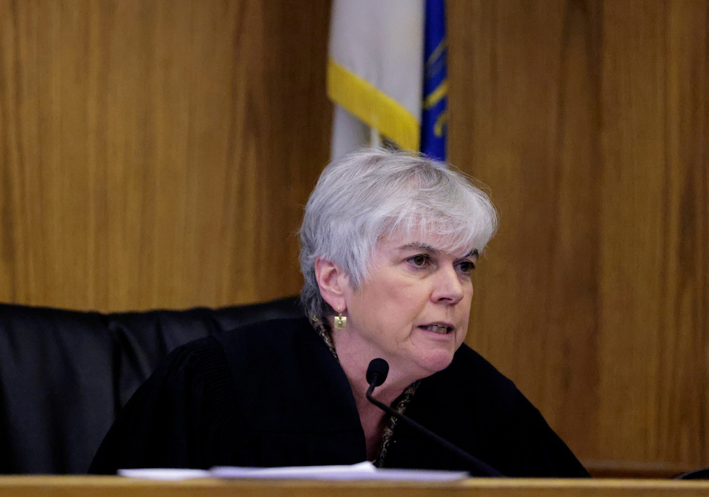 Judge Jeanmarie Carroll questions potential jurors as the assault trial of Stefon Diggs begins in Dedham, Mass., Monday May 4, 2026. (Pat Greenhouse/The Boston Globe via AP, Pool)