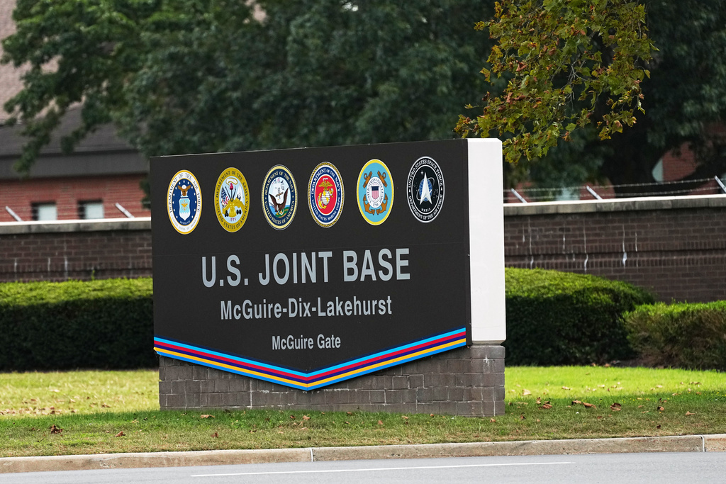 A sign for U.S. Joint Base McGuire-Dix-Lakehurst in New Jersey is seen Tuesday, Sept. 30, 2025. (AP Photo/Matt Rourke)