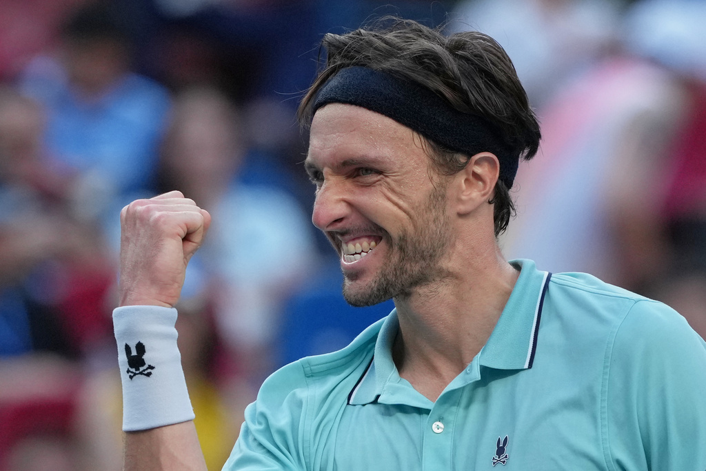 Arthur Rinderknech of France reacts after defeating Felix Auger-Aliassime of Canada in their men's singles quarterfinal match of the Shanghai Masters tennis tournament at Qizhong Forest Sports City Tennis Center, in Shanghai, China, Friday, Oct. 10, 2025. (AP Photo/Andy Wong)