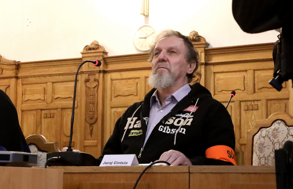 Juraj Cintula, who shot and seriously injured Prime minister of Slovakia Robert Fico last year,attends hearings at the Specialized Criminal Court in Banska Bystrica, Slovakia, Tuesday, Oct. 21, 2025. (Jan Kroslak/TASR via AP)