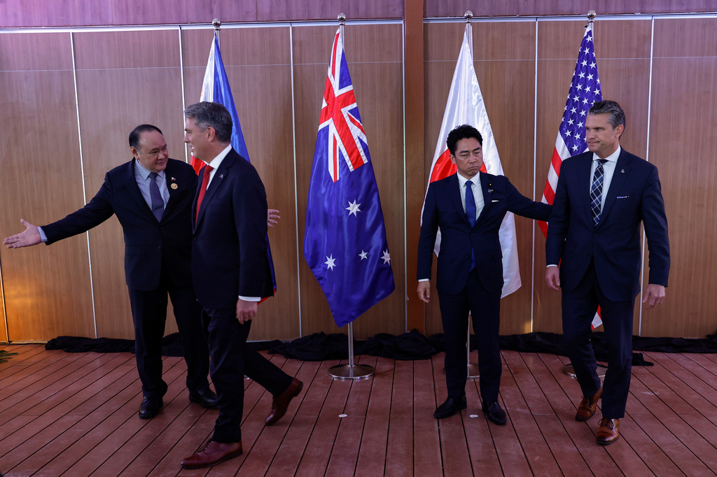 From left, Philippines Defense Secretary Gilberto Teodoro, Australia Defense Minister Richard Marles, Japan Defense Minister Shinjiro Koizumi and U.S.Defense Secretary Pete Hegseth prepare to leave after posing for pictures before holding a Quadrilateral Meeting on the sidelines of the 20th Association of Southeast Asian Nations (ASEAN) Defence Ministers' Meeting (ADMM) and 13th ADMM-Plus Meetings in Cebu, Philippines, Wednesday, Oct. 28, 2026. .(Rolex Dela Pena/Pool Photo via AP)