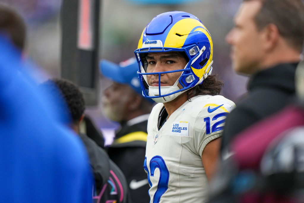 Los Angeles Rams wide receiver Puka Nacua looks on from the sideline during the second half of an NFL football game against the Baltimore Ravens Sunday, Oct. 12, 2025, in Baltimore. (AP Photo/Stephanie Scarbrough)