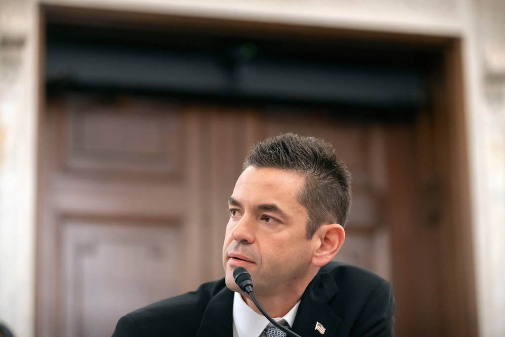 Jared Isaacman, President Donald Trump's pick to be NASA Administrator, listens during a hearing of the Senate Commerce, Science, and Transportation Committee on Capitol Hill, Wednesday, Dec. 3, 2025, in Washington. (AP Photo/Mark Schiefelbein)