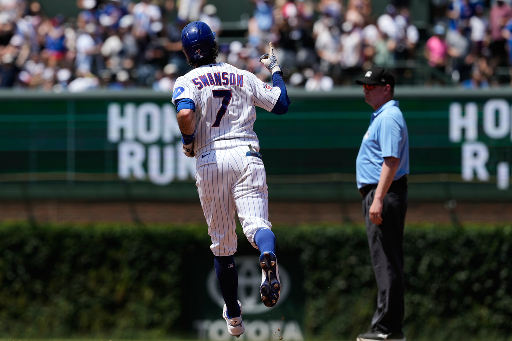 Chicago Cubs' Dansby Swanson celebrates as he rounds the bases after hitting a three-run home run during the third inning of a baseball game against the San Diego Padres in Chicago, Wednesday, July 1, 2026. (AP Photo/Nam Y. Huh)