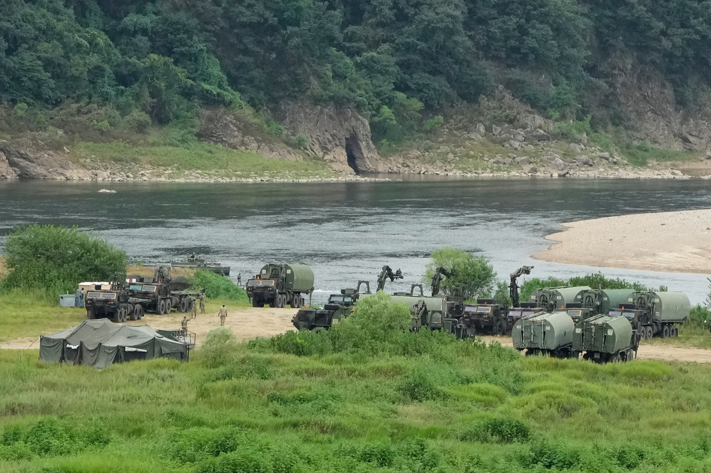 U.S. Army's armored vehicles gather to cross a river at a training field in Yeoncheon, South Korea, near the border with North Korea, Monday, Aug. 17, 2026. (AP Photo/Ahn Young-joon)