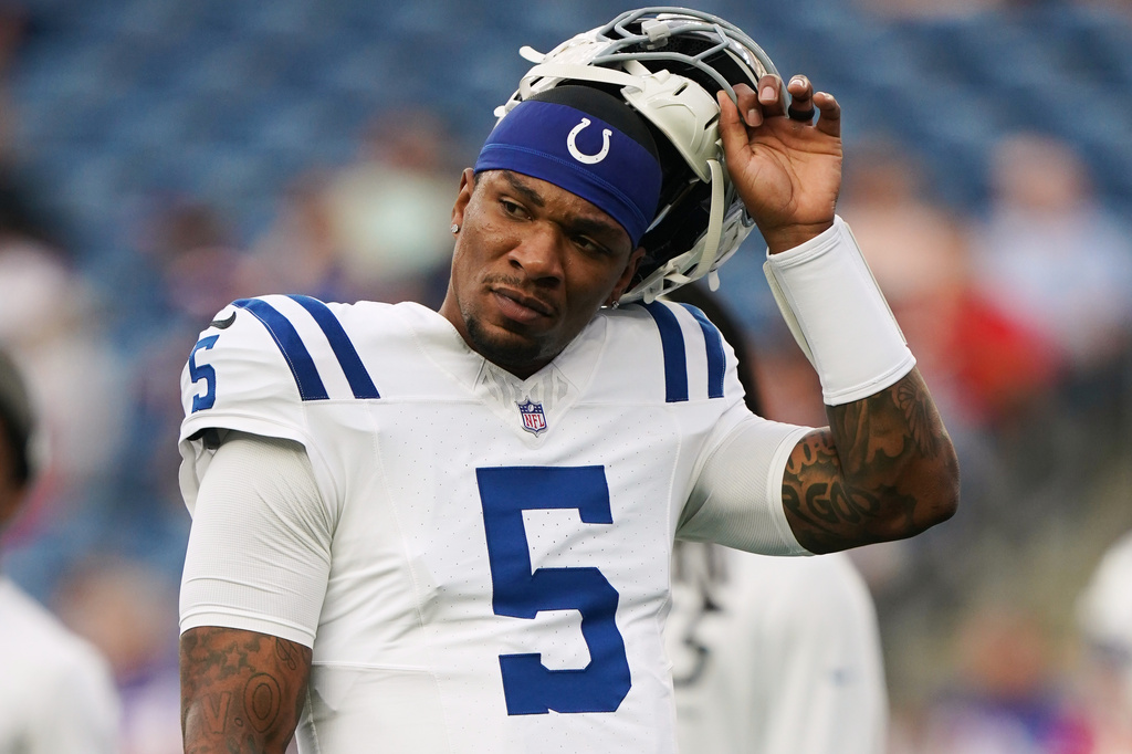 FILE - Indianapolis Colts quarterback Anthony Richardson (5) takes off his helmet before a preseason NFL football game against the New England Patriots in Foxborough, Mass.,Thursday, Aug. 13, 2026. (AP Photo/Vera Nieuwenhuis, File)