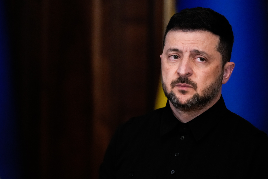 Ukraine's President Volodymyr Zelenskyy listens as High Representative of the European Union for Foreign Affairs and Security Policy Kaja Kallas speaks during a news conference, Monday, Oct. 13, 2025, in Kyiv, Ukraine. (AP Photo/Julia Demaree Nikhinson)