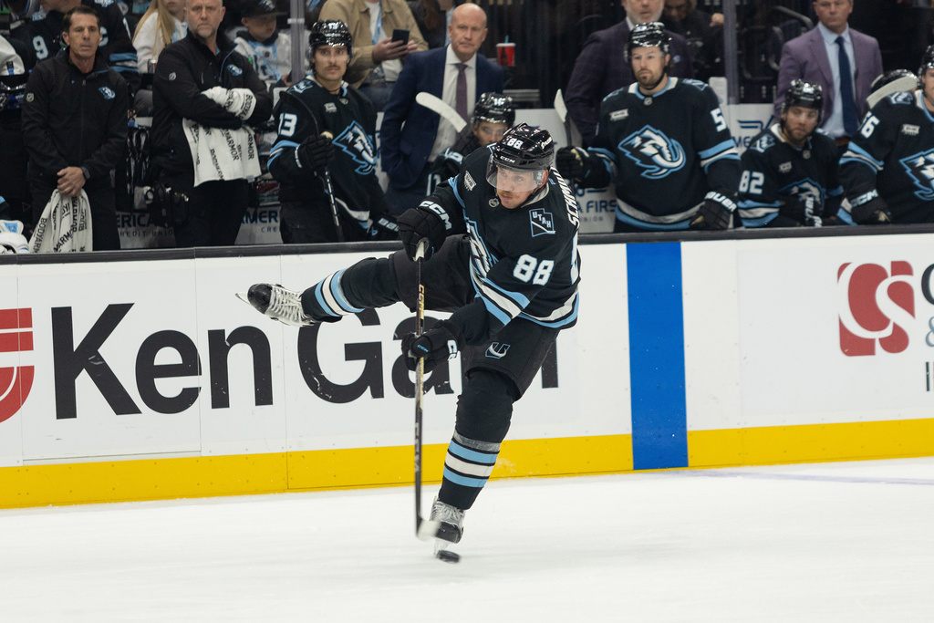 Utah Mammoth defenseman Nate Schmidt shoots against the Tampa Bay Lightning during the second period of an NHL hockey game Sunday, Nov. 2, 2025, in Salt Lake City. (AP Photo/Melissa Majchrzak)