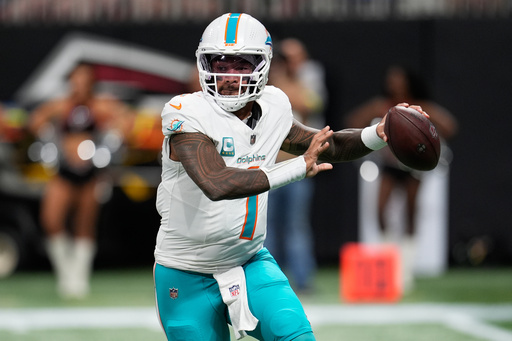 Miami Dolphins quarterback Tua Tagovailoa (1) looks to pass during the first half of an NFL football game against the Atlanta Falcons, Sunday, Oct. 26, 2025, in Atlanta. (AP Photo/Mike Stewart) Miami Dolphins quarterback Tua Tagovailoa (1) looks to pass during the first half of an NFL football game against the Atlanta Falcons, Sunday, Oct. 26, 2025, in Atlanta. (AP Photo/Mike Stewart)