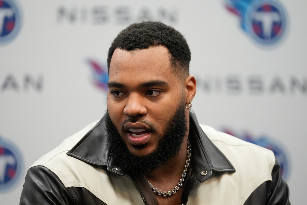Tennessee Titans defensive tackle Jeffery Simmons talks to reporters after an NFL football game against the New Orleans Saints, Sunday, Dec. 28, 2025, in Nashville, Tenn. (AP Photo/George Walker IV)
