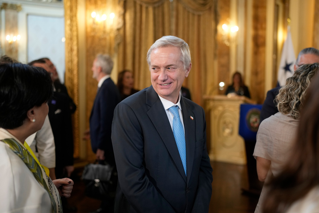 Chilean President-elect Jose Antonio Kast leaves a ceremony at the presidential palace in Panama City, Wednesday, Jan. 28, 2026. (AP Photo/Matias Delacroix)