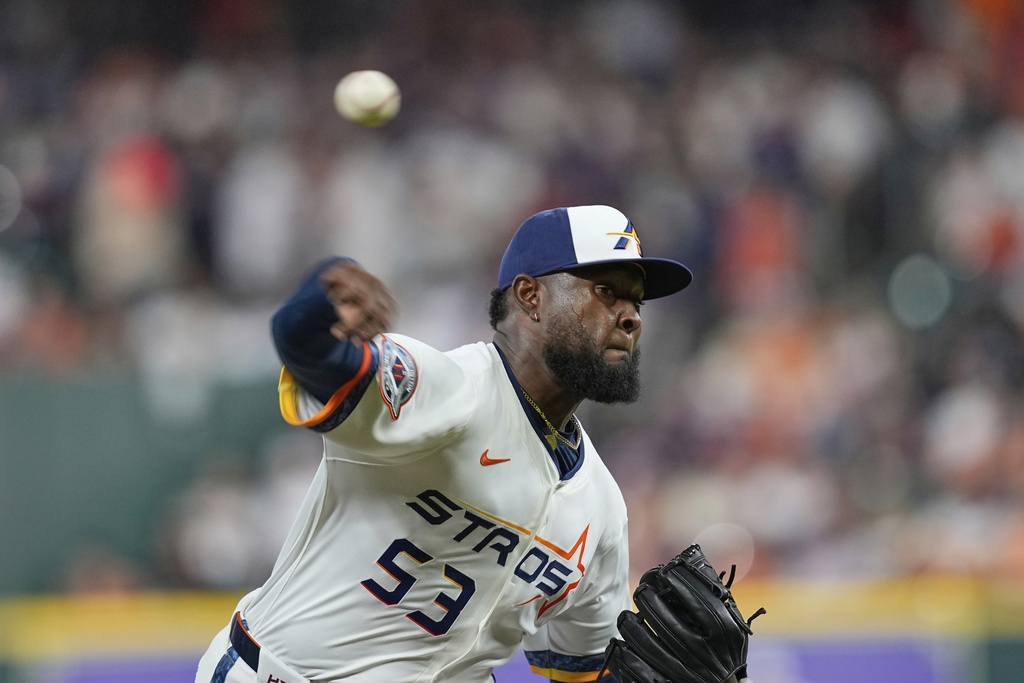 Houston Astros starting pitcher Cristian Javier throws against the Boston Red Sox during the first inning of a baseball game Monday, Aug. 11, 2025, in Houston. (AP Photo/David J. Phillip)