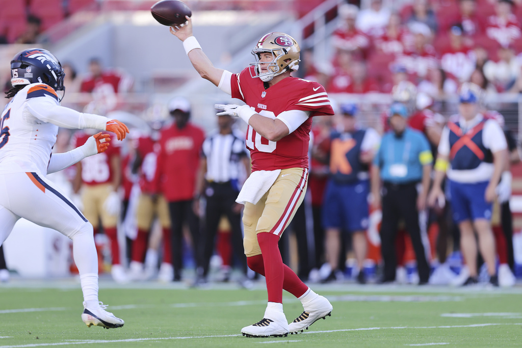 San Francisco 49ers quarterback Mac Jones (10) throws a pass during the first half of a preseason NFL football game against the Denver Broncos, Saturday, Aug. 9, 2025, in Santa Clara, Calif. (AP Photo/Kelley L Cox)