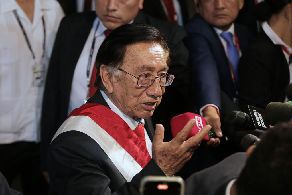 FILE - Interim President Jose Maria Balcazar speaks to reporters upon arriving at the presidential palace after he was appointed by lawmakers, in Lima, Peru, Feb. 18, 2026. (AP Photo/Gerardo Marin, File)