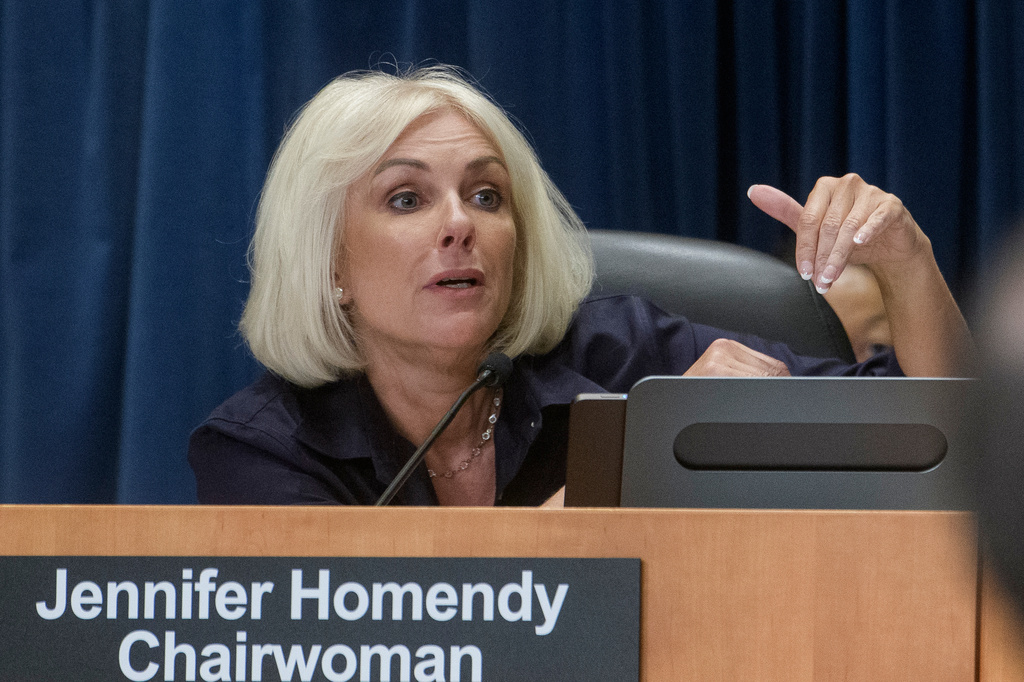 FILE - National Transportation Safety Board Chairwoman Jennifer Homendy presides over the NTSB fact-finding hearing on the DCA midair collision accident, at the National Transportation and Safety Board boardroom, July 30, 2025, in Washington. (AP Photo/Rod Lamkey, Jr., File)