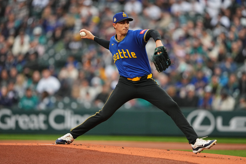 Seattle Mariners starting pitcher George Kirby throws against the Cleveland Guardians during the first inning of a baseball game, Friday, March 27, 2026, in Seattle. (AP Photo/Lindsey Wasson)
