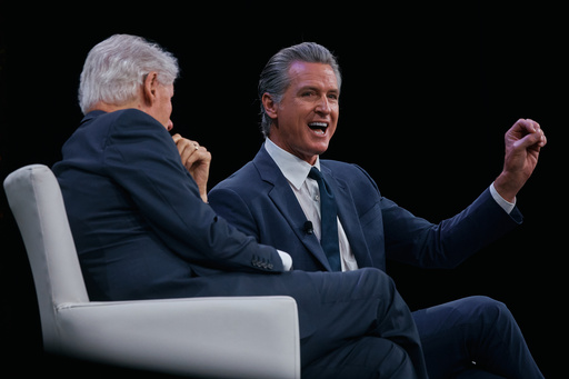 Governor of California Gavin Newsom, right, speaks next to former U.S. President Bill Clinton, left, during the Clinton Global Initiative on Wednesday, Sept. 24, 2025, in New York. (AP Photo/Andres Kudacki) Governor of California Gavin Newsom, right, speaks next to former U.S. President Bill Clinton, left, during the Clinton Global Initiative on Wednesday, Sept. 24, 2025, in New York. (AP Photo/Andres Kudacki)