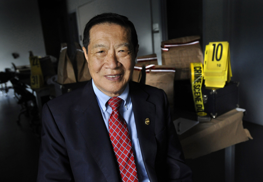 FILE - In this Aug. 4, 2011 photo, Dr. Henry Lee poses for a photograph at the Henry C. Lee Institute of Forensic Science, on the campus of the University of New Haven in New Haven, Conn. (AP Photo/Jessica Hill, File)