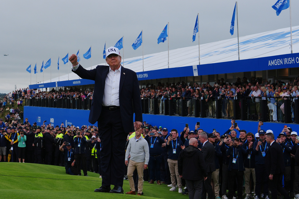 U.S. President Donald Trump attends the Irish Open golf tournament at Trump International Golf Links in Doonbeg, Ireland, Sunday, Sept. 13, 2026. (AP Photo/Julia Demaree Nikhinson)