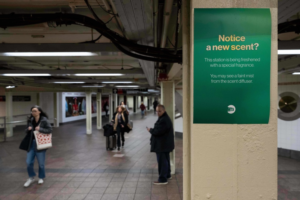 A poster reading "Notice a new scent?" Is displayed at Grand Central Terminal, Wednesday, Nov. 19, 2025, in New York. (AP Photo/Yuki Iwamura)