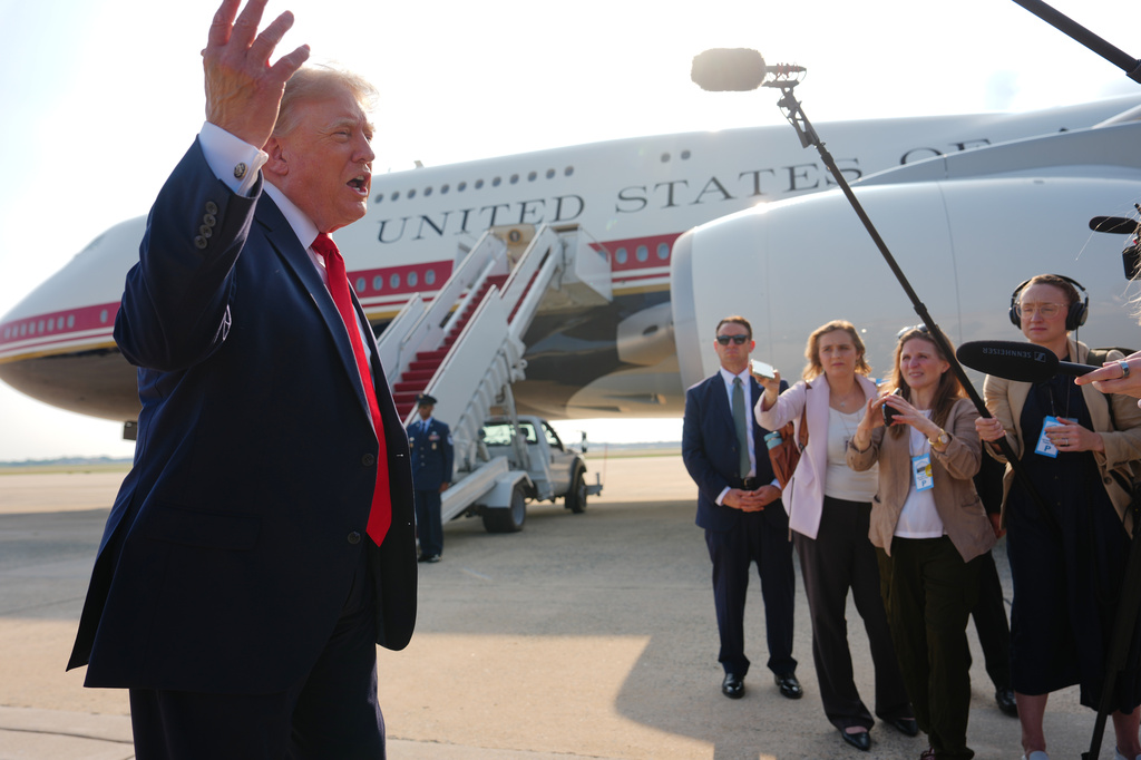 President Donald Trump speaks to reporters before boarding Air Force One, Wednesday, July 1, 2026, at Joint Base Andrews, Md. (AP Photo/Julia Demaree Nikhinson)