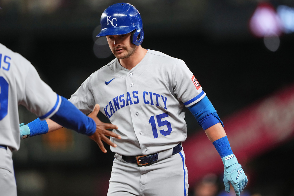 Kansas City Royals' Lane Thomas celebrates hitting an RBI single against the Seattle Mariners during the eighth inning of a baseball game, Friday, May 1, 2026, in Seattle. (AP Photo/Lindsey Wasson)