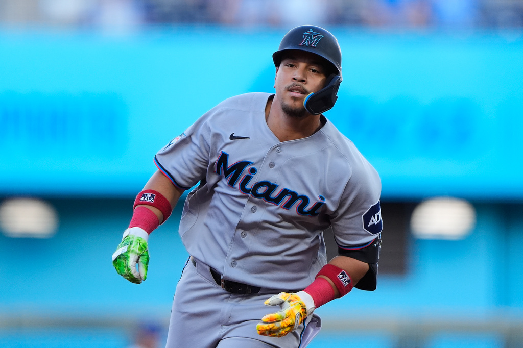 Miami Marlins' Heriberto Hernandez celebrates as he runs the bases after hitting a solo home run during the first inning of a baseball game against the Kansas City Royals, Thursday, Sept. 3, 2026, in Kansas City, Mo. (AP Photo/Charlie Riedel)
