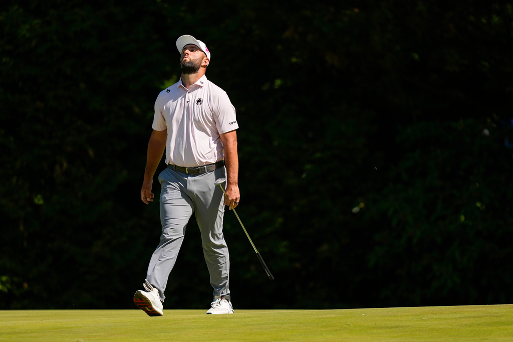 Jon Rahm, of Spain, reacts to a missed putt on the 12th green during the third round of the PGA Championship golf tournament at Aronimink Golf Club, Saturday, May 16, 2026, in Newtown Square, PA. (AP Photo/Matt Slocum)