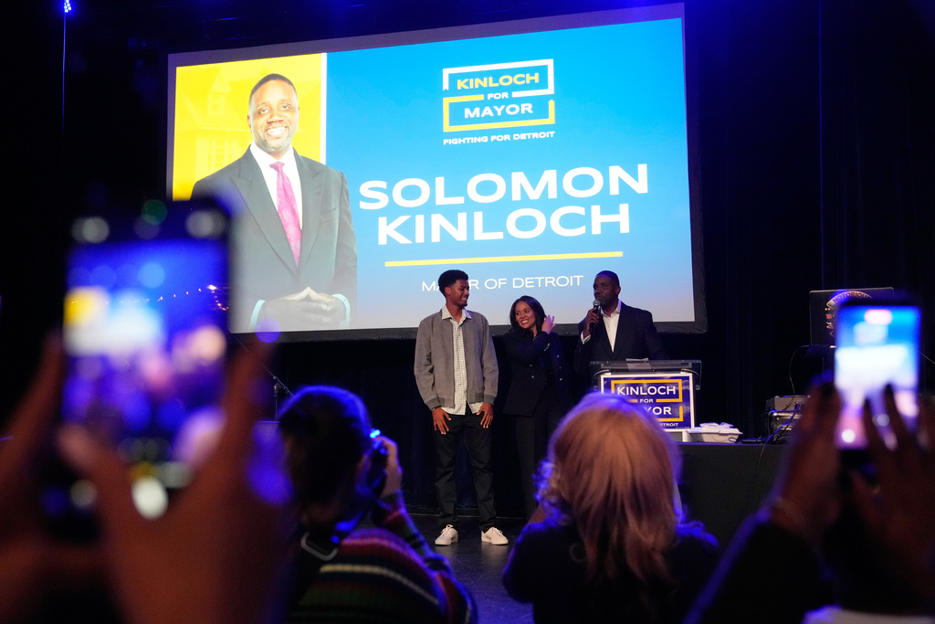 Detroit mayoral candidate Solomon Kinloch, center right, speaks during an election night watch party on Tuesday, Nov. 4, 2025, in Detroit. (AP Photo/Ryan Sun)