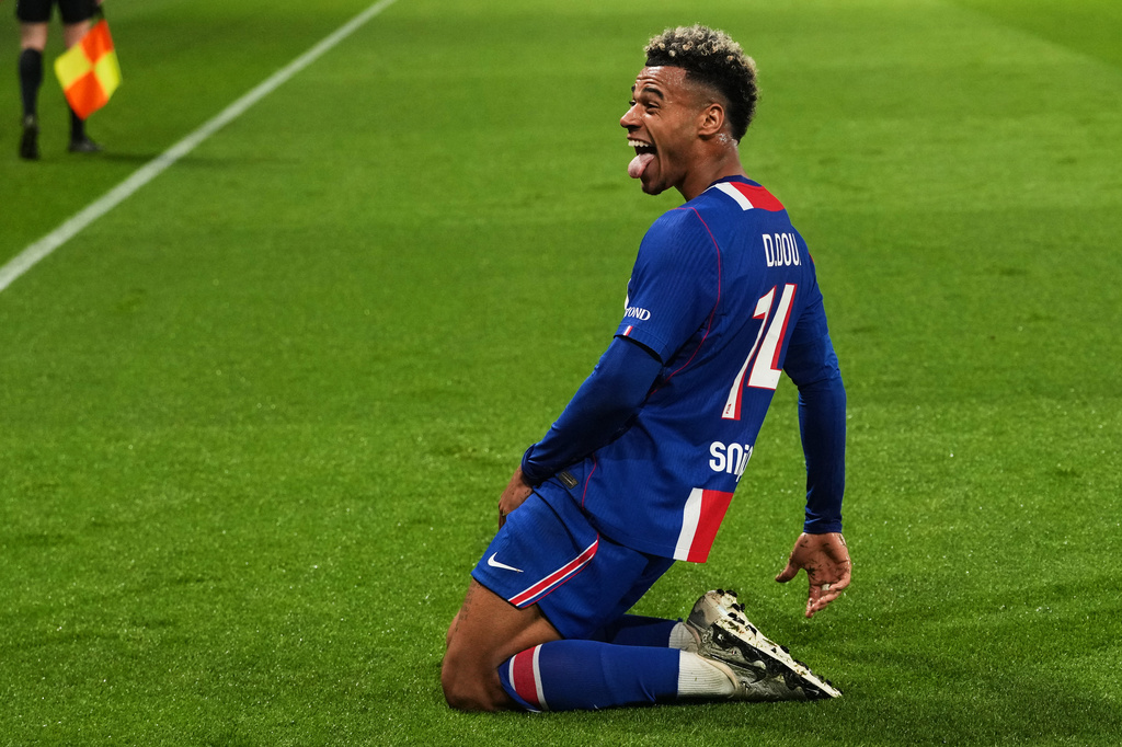 PSG's Desire Doue celebrates scoring his side's opening goal during the French League One soccer match between Paris Saint Germain and Brest in Paris, France, Sunday, May 10, 2026. (AP Photo/Thibault Camus)