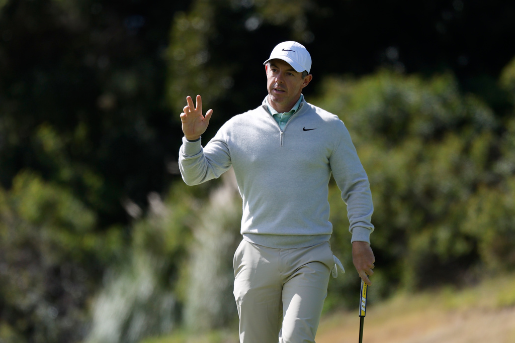 Rory McIlroy, from Northern Ireland, waves after putting on the fourth hole during the second round of the Genesis Invitational golf tournament at Riviera Country Club, Friday, Feb. 20, 2026, in the Pacific Palisades area of Los Angeles. (AP Photo/Caroline Brehman)