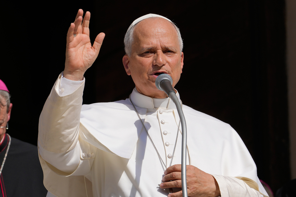 FILE - Pope Leo XIV delivers his blessing as he visits Pavia's Cathedral, northern Italy, on June 20, 2026. (AP Photo/Luca Bruno, File)