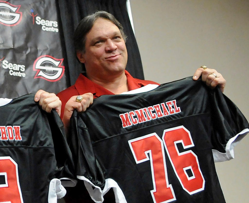 FILE - Former Chicago Bears defensive tackle Steve McMichael holds a Chicago Slaughter jersey during a news conference Feb. 19, 2010, in Chicago. (John J. Kim/Chicago Sun-Times via AP, File)