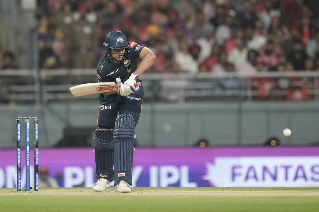 Gujarat Titans' captain Shubman Gill plays a shot during the Indian Premier League cricket match between Gujarat Titans and Punjab Kings in New Chandigarh, India, Tuesday, March 31, 2026. (AP Photo/Ashwini Bhatia)