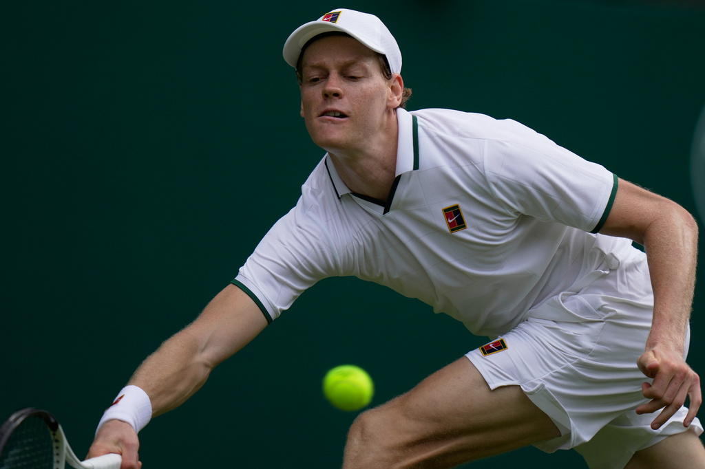 Jannik Sinner of Italy returns the ball to Nuno Borges of Portugal in their second round men's singles match at the Wimbledon Tennis Championships in London, Wednesday, July 1, 2026. (AP Photo/Brian Inganga)