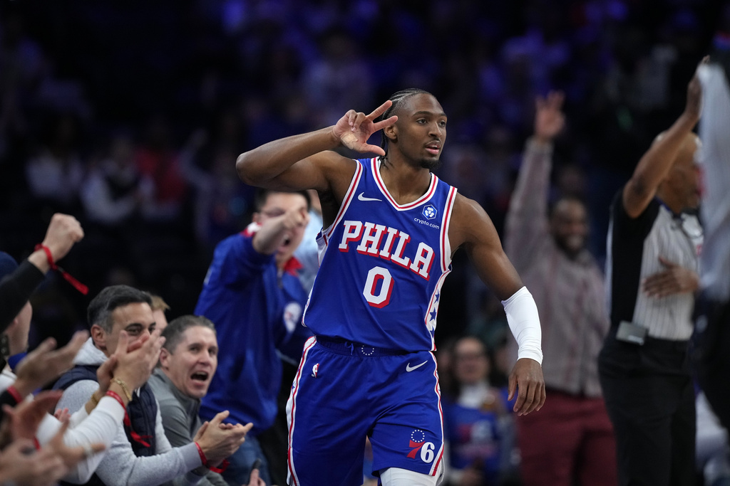 Philadelphia 76ers' Tyrese Maxey reacts after making a basket during the first half of an NBA basketball game against the Sacramento Kings Thursday, Jan. 29, 2026, in Philadelphia. (AP Photo/Matt Slocum)