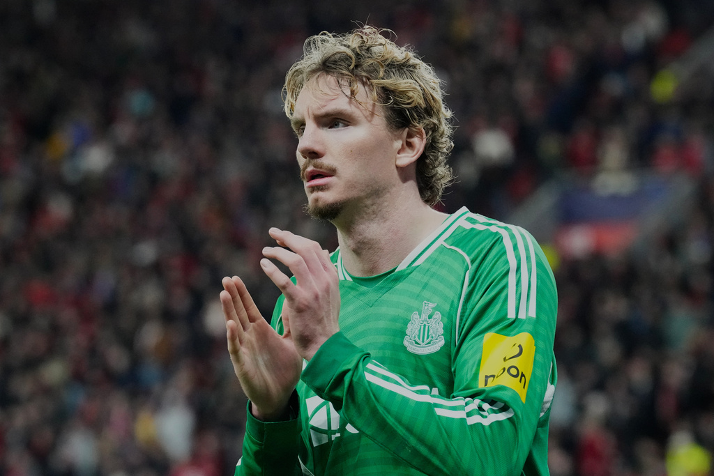 Newcastle's Nick Woltemade reacts during the Champions League opening phase soccer match between Bayer Leverkusen and Newcastle United in Leverkusen, Germany, Wednesday, Dec. 10, 2025. (AP Photo/Martin Meissner)