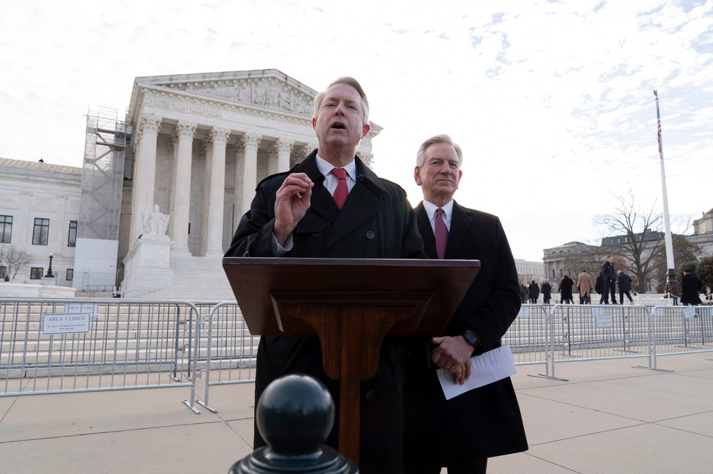 FILE - Sen. Roger Marshall R-Kan. and Sen. Tommy Tuberville R-Ala. speak to reporters outside of the U.S. Supreme Court, Thursday, Feb. 8, 2024, in Washington. (AP Photo/Jose Luis Magana, File)