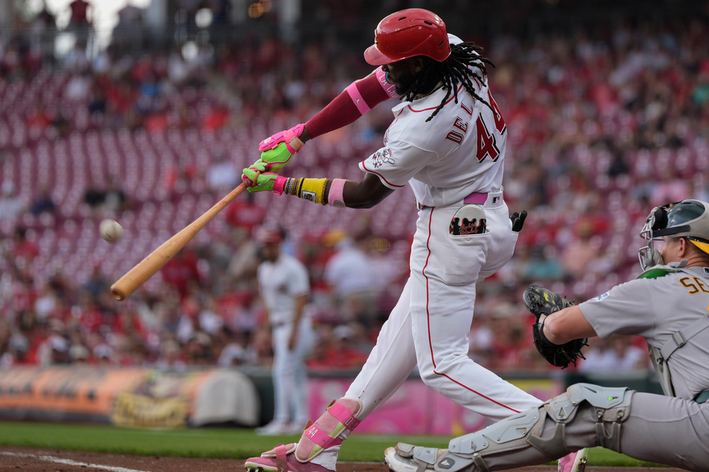 Cincinnati Reds shortstop Elly De La Cruz hits a solo home run during the first inning of a baseball game against the Athletics in Cincinnati, Thursday, Aug. 6, 2026. (AP Photo/Carolyn Kaster)
