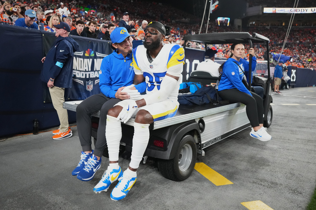 Los Angeles Rams cornerback Jaylen Watson leaves the field on a cart during the first half of an NFL football game against the Denver Broncos, Sunday, Sept. 27, 2026, in Denver. (AP Photo/David Zalubowski)