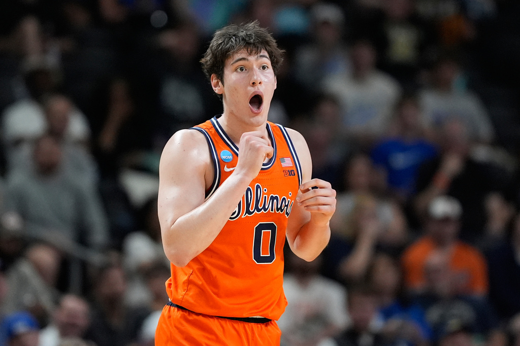 Illinois forward David Mirkovic (0) reacts after getting a foul during the first half in the second round of the NCAA college basketball tournament against Virginia Commonwealth, Saturday, March 21, 2026, in Greenville, S.C. (AP Photo/Brynn Anderson)