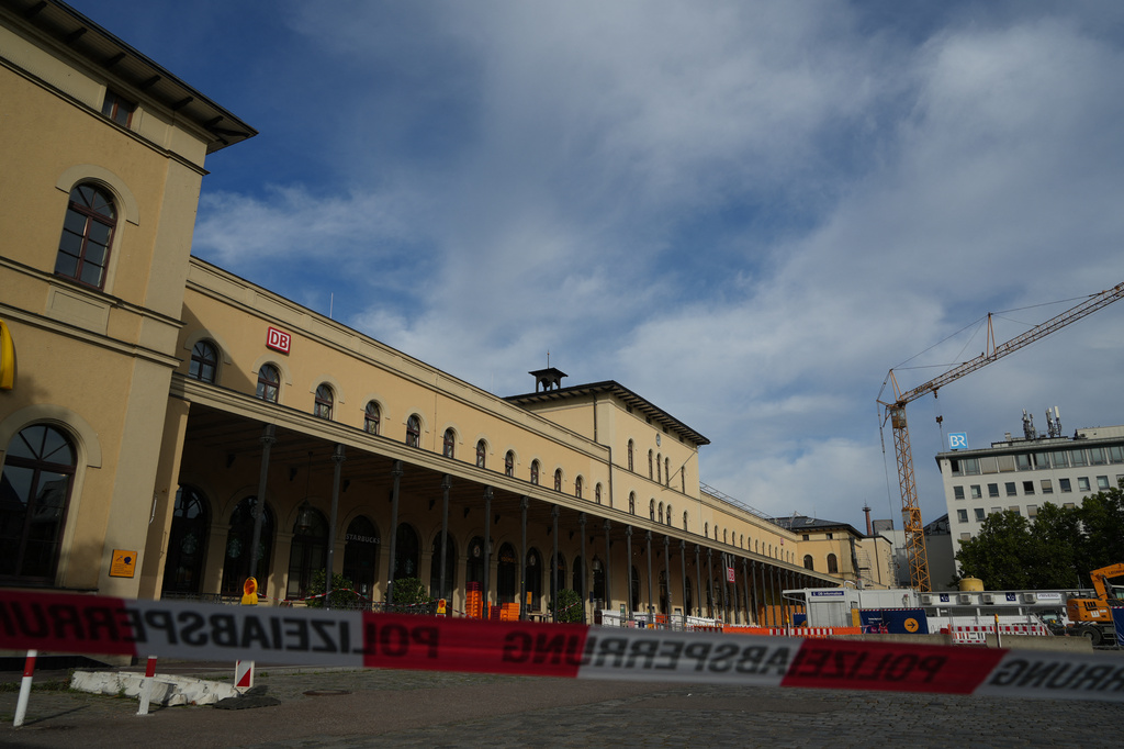 Police cordon off the area near the train station in the southern German city of Augsburg, Wednesday, Sept. 2, 2026. (Felix Kirberg/dpa via AP)