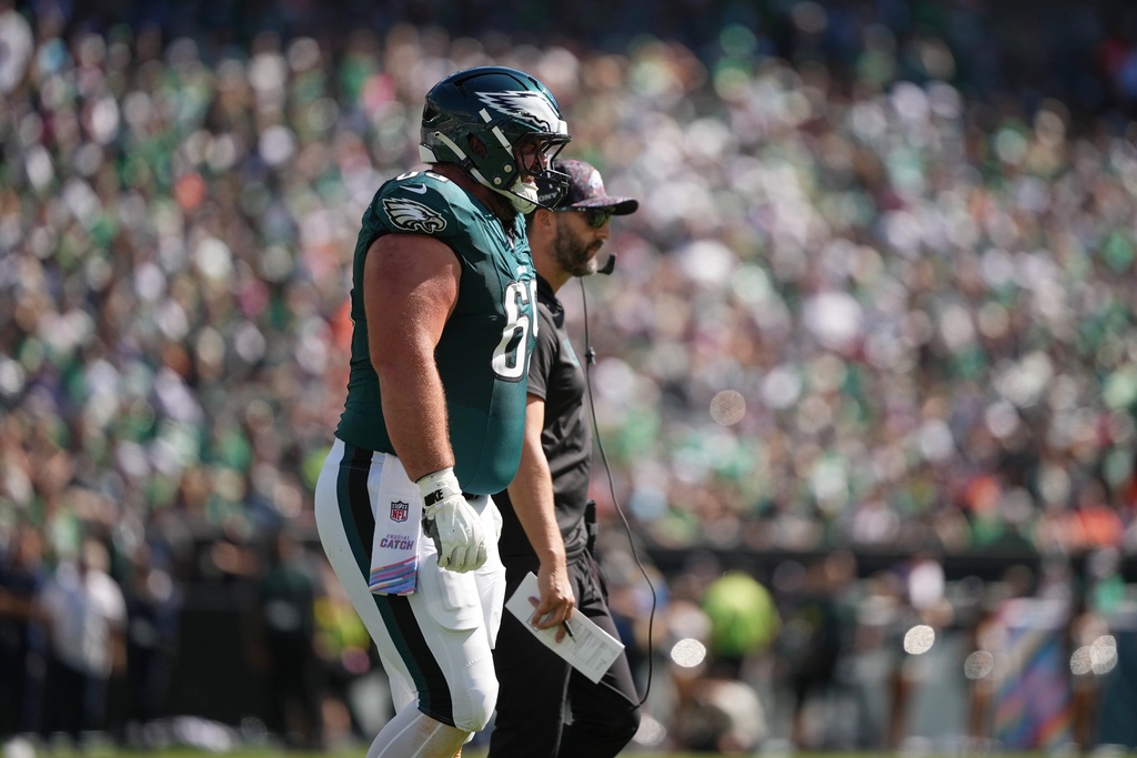 Philadelphia Eagles guard Landon Dickerson (69) walks off the field after an injury during the first half of an NFL football game against the Denver Broncos on Sunday, Oct. 5, 2025, in Philadelphia. (AP Photo/Matt Slocum)