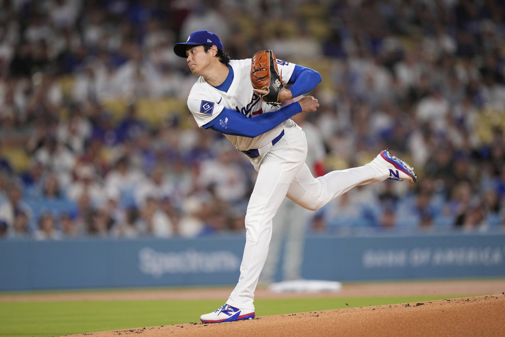 Los Angeles Dodgers starting pitcher Shohei Ohtani works against a Philadelphia Phillies batter during the first inning of a baseball game Tuesday, Sept. 16, 2025, in Los Angeles. (AP Photo/Mark J. Terrill)