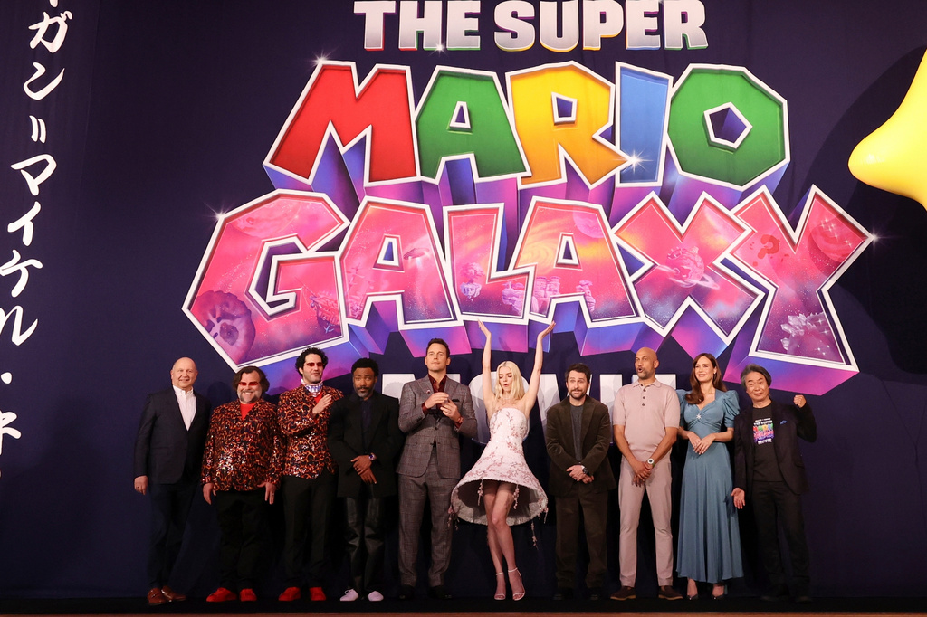 Jack Black, from second left, Benny Safdie, Donald Glover, Chris Pratt, Anya Taylor-Joy, Charlie Day, Keegan Michael Key and Brie Larson pose for photographers at the World premiere of the film "The Super Mario Galaxy Movie" in Kyoto Japan,, Saturday, March 28, 2026. (AP Photo/Rodrigo Reyes)