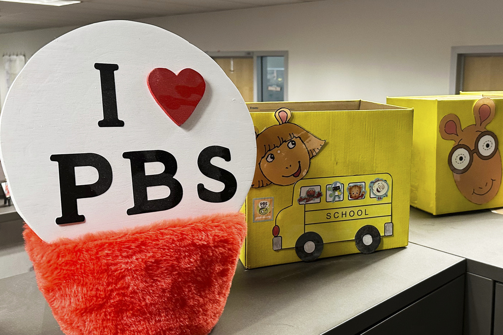 FILE - PBS Kids show characters including the title character from "Arthur" decorate boxes at the Arizona PBS offices in the Walter Cronkite School of Journalism and Mass Communication in Phoenix, May 2, 2025. (AP Photo/Katie Oyan, File)