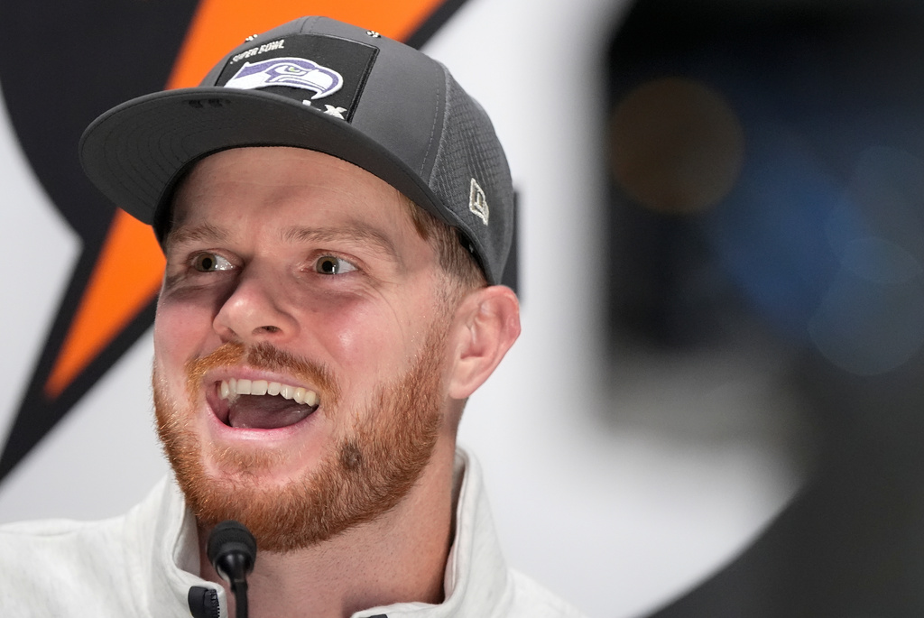 Seattle Seahawks quarterback Sam Darnold speaks during the NFL Super Bowl Opening Night, Monday, Feb. 2, 2026, in San Jose, Calif. ahead of the Super Bowl 60 football game between the New England Patriots and the Seattle Seahawks. (AP Photo/Brynn Anderson)