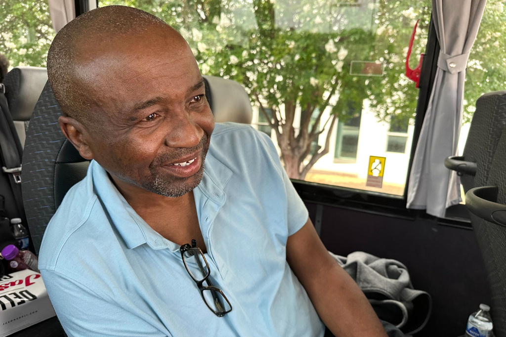 Keith Odom, a forklift driver from Aiken, S.C., looks out from his bus seat as he arrives in Montgomery, Ala., for a voting rights rally Saturday, May 16, 2026. (AP Photo/Bill Barrow)